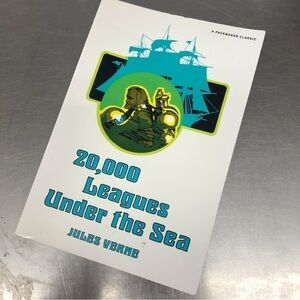 20,000 Leagues Under the Sea by: Jules Verne, paperback book